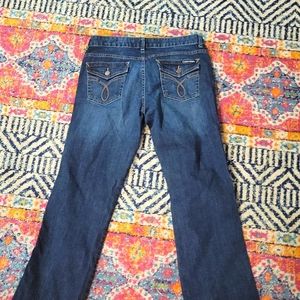 Calvin Klein lean bootcut jeans,  size 12 with flap pockets.